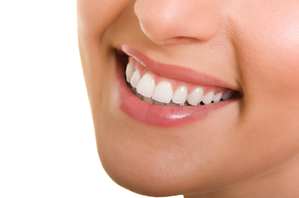 Female smile close-up view - straight, white teeth